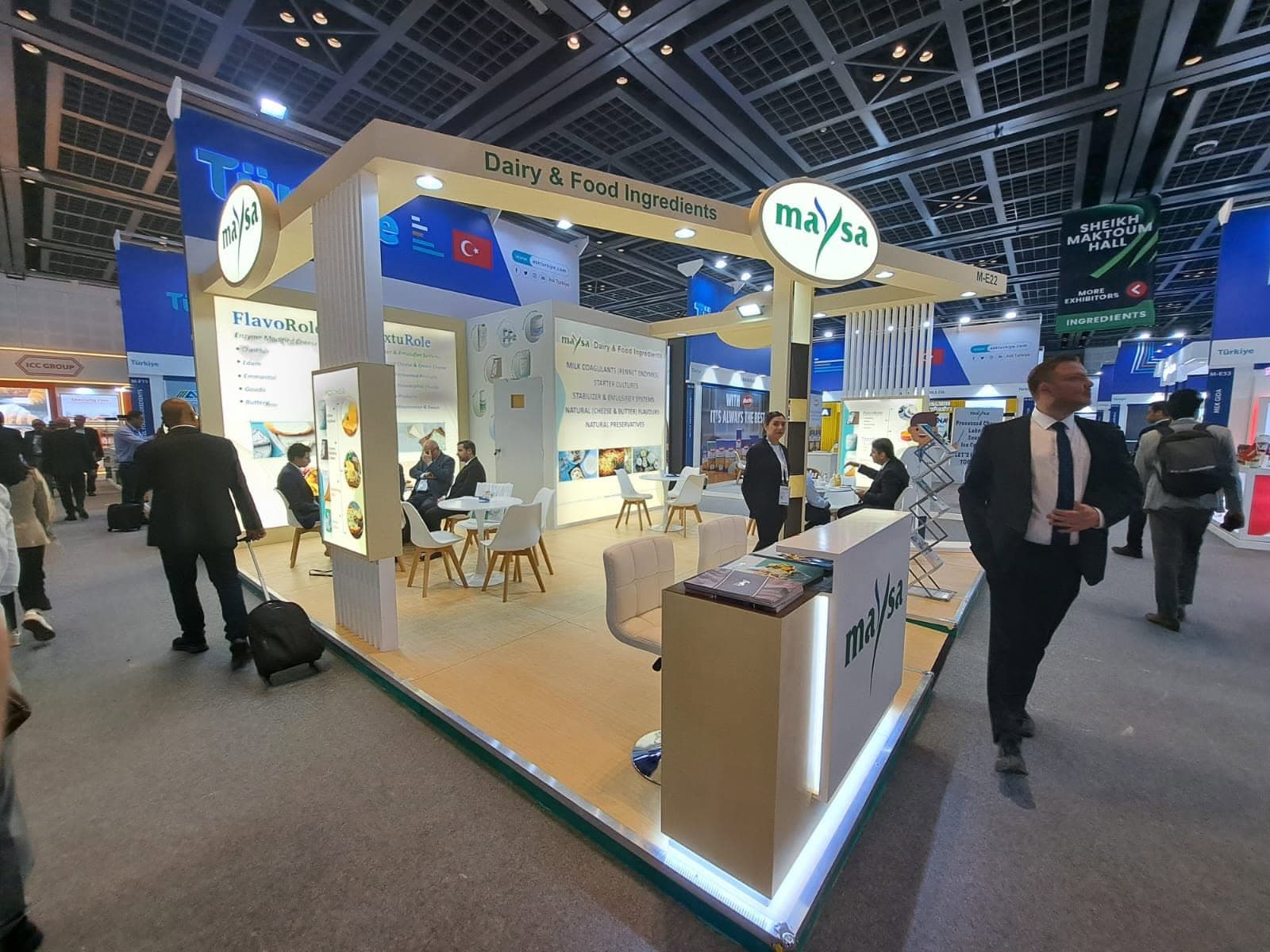 Maysa dairy and food ingredients stand in the Türkiye hall, an open portal frame over consultation tables